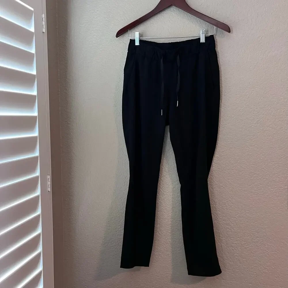 Lululemon On The Fly Black Pants Size 4 Women’s Elastic Waist Side Pockets - Picture 4 of 7